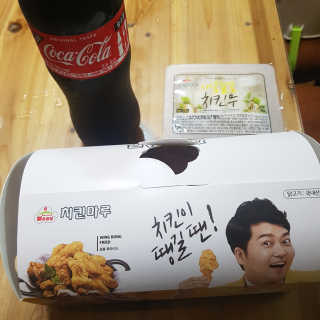 [치킨마루]-  빠사칸윙봉현미 + 콜라 500ml — 4점을 준 리뷰어가 2019년 7월 올린 사용 사진