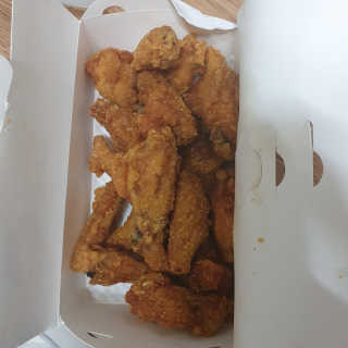 [치킨마루]-  빠사칸윙봉현미 + 콜라 500ml — 4점을 준 리뷰어가 2019년 7월 올린 사용 사진