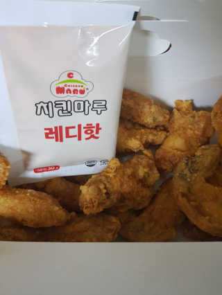 [치킨마루]-  빠사칸윙봉현미 + 콜라 500ml — 5점을 준 리뷰어가 2019년 7월 올린 사용 사진