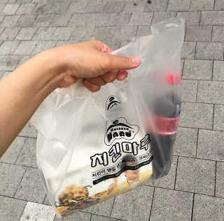 [치킨마루]-  빠사칸윙봉현미 + 콜라 500ml — 5점을 준 리뷰어가 2019년 7월 올린 사용 사진