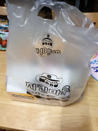 [치킨마루]-  빠사칸윙봉현미 + 콜라 500ml — 5점을 준 리뷰어가 2019년 7월 올린 사용 사진