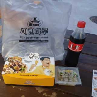 [치킨마루]-  빠사칸윙봉현미 + 콜라 500ml — 4점을 준 리뷰어가 2019년 7월 올린 사용 사진