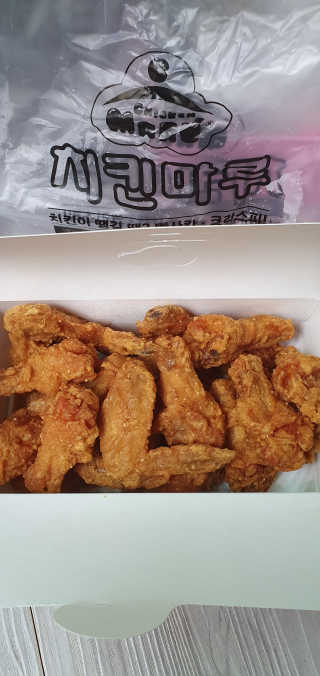 [치킨마루]-  빠사칸윙봉현미 + 콜라 500ml — 5점을 준 리뷰어가 2019년 7월 올린 사용 사진