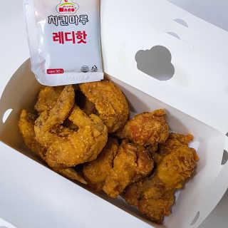 [치킨마루]-  빠사칸윙봉현미 + 콜라 500ml — 5점을 준 리뷰어가 2019년 7월 올린 사용 사진