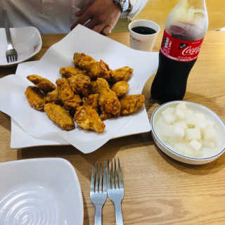 [치킨마루]-  빠사칸윙봉현미 + 콜라 500ml — 5점을 준 리뷰어가 2019년 7월 올린 사용 사진