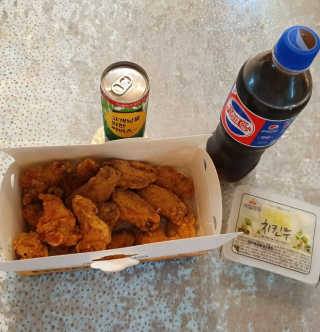 [치킨마루]-  빠사칸윙봉현미 + 콜라 500ml — 5점을 준 리뷰어가 2019년 7월 올린 사용 사진